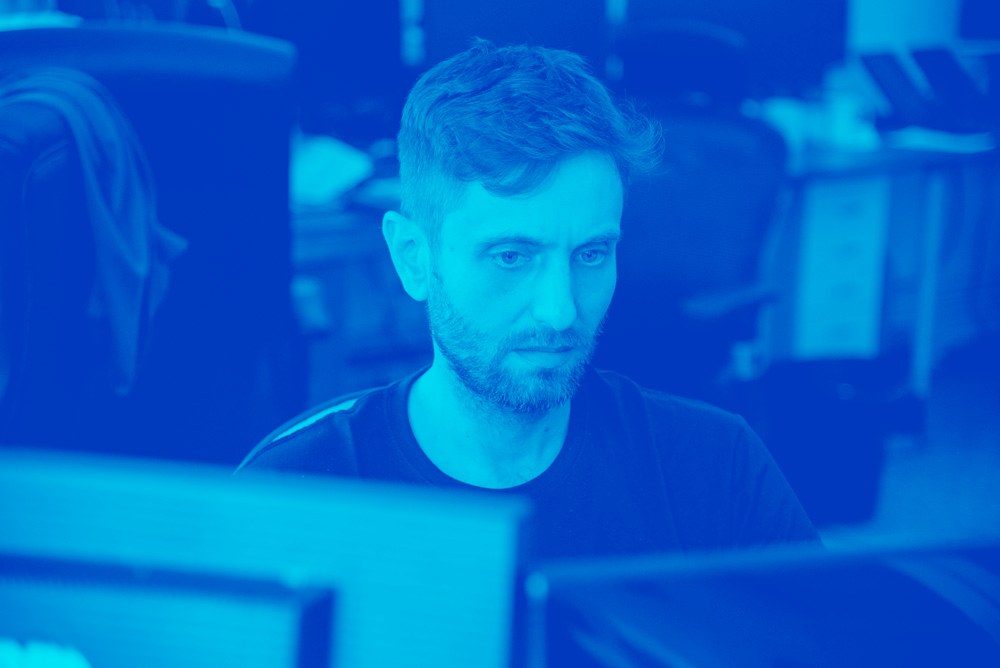 George Kastanis, our AI track lead, working at his desk in the Point Blank office